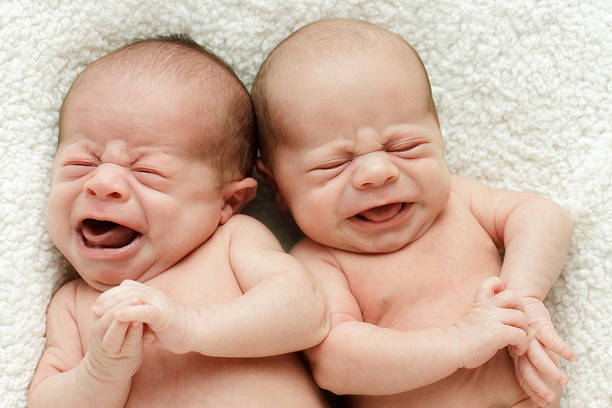 Crying Newborn Twins stock photo