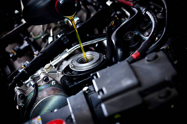 Oil change Oil changing. lubrication stock pictures, royalty-free photos & images