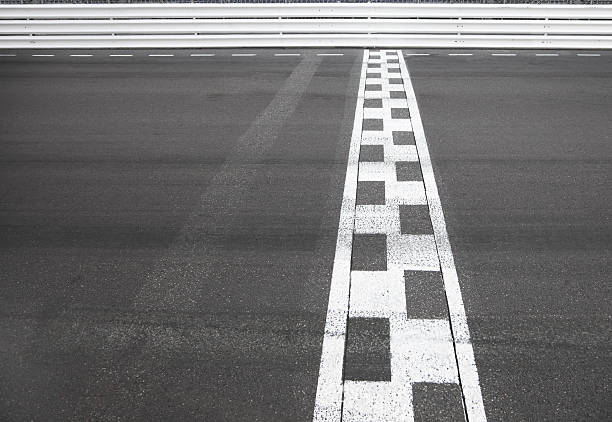 Finish Line of a motor race sports track road stock photo