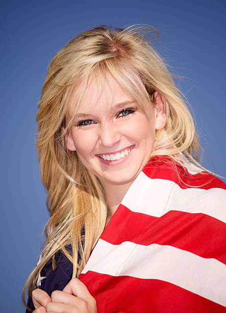 istock Pretty Young Woman with American Flag 182789018