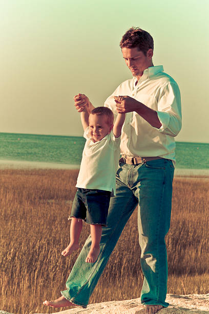 Portrait of boy (9-10) with his father, smiling, portrait