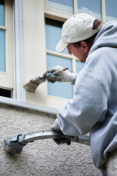 istock Painter Painting Exterior Window Frame Trim, House Home Maintenance Vt 182789761