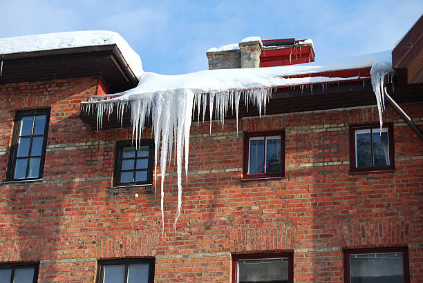 Detail of old building with snow stock photo