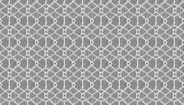 Vector illustration of Geometric lace fabric composed of diamonds, circles, and hexagons.