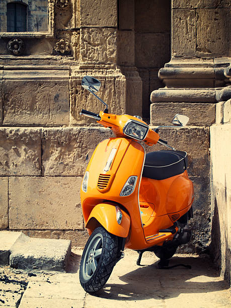 Orange Scooter stock photo