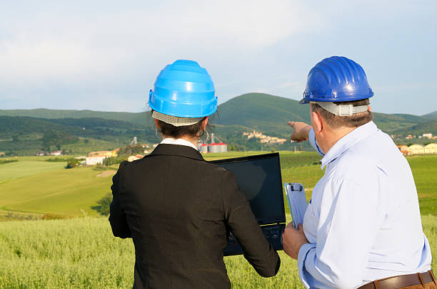 istock Two Engineers with Laptop in the Countryside 182791145