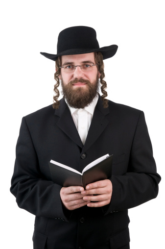 smiling rabbi looking at camera - isolated on white