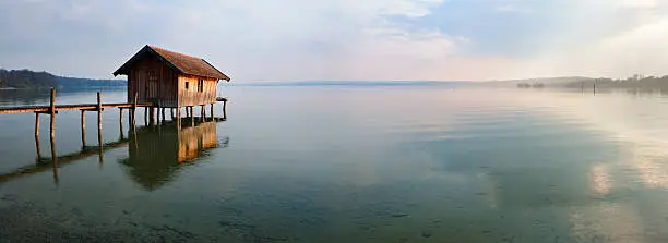 Traditional Boathouse on Lake Dock at Sunset, Ammersee, Bavaria, Germany