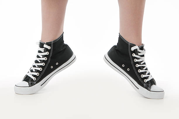 istock black sport shoes on tip toes 182791669