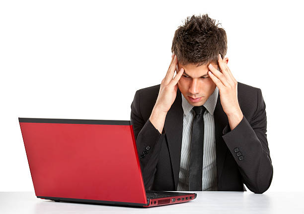istock young handsome man with laptop 182791677
