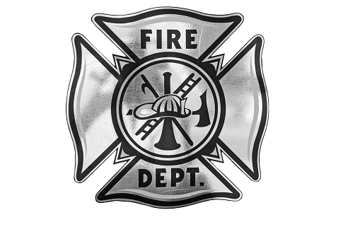 An isolated picture of a fire department symbol. This was on a fire truck door and the edges of the decal have been rubbed against and are ragged.