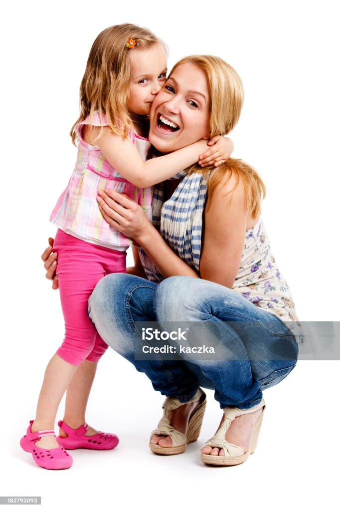 Mother with daughter isolated on white Mother with daughter isolated on whiteCheckout my lightboxes: Daughter Stock Photo