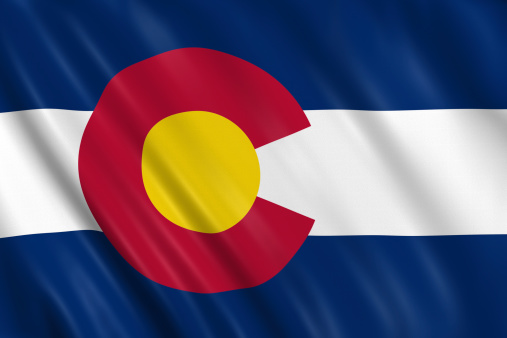 flag of colorado waving with highly detailed textile texture pattern