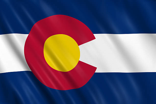 flag of colorado flag of colorado waving with highly detailed textile texture pattern us state flag stock pictures, royalty-free photos & images