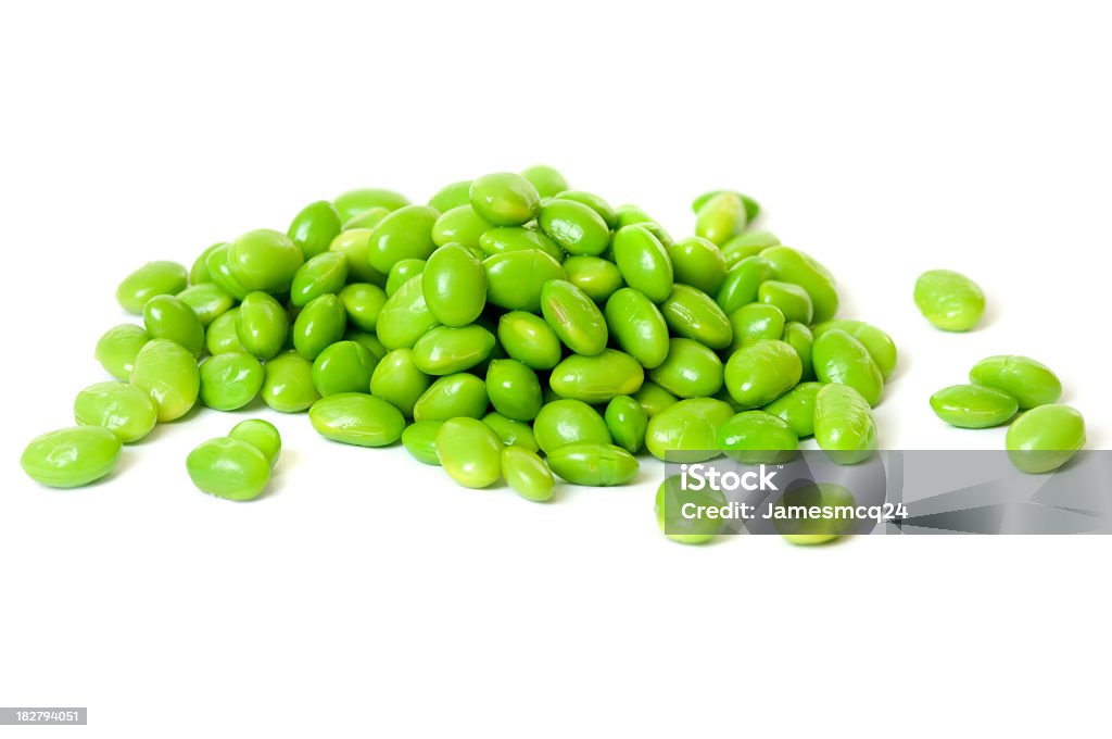 A heap of soybeans on white background A heap of soybeans isolated on white. Edamame Stock Photo