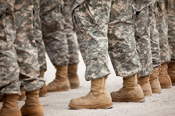 Soldiers in formation Troops in formation. us marine corps stock pictures, royalty-free photos & images