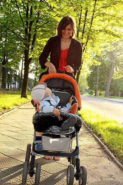 istock On the walk - mother and son 182794263
