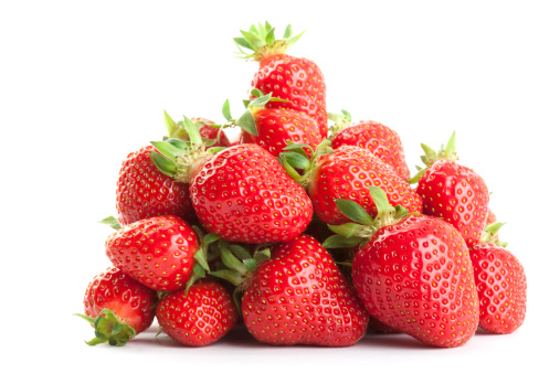 Group of fresh strawberries on white
