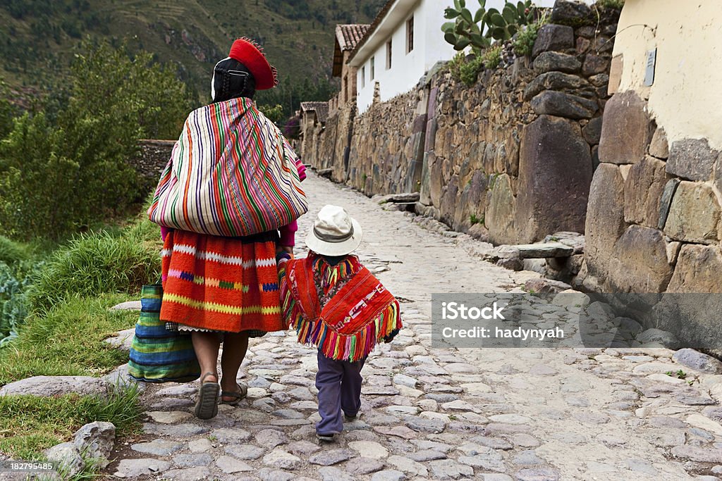Peruvian woman with her baby, The Sacred Valley, Cuzco The Sacred Valley of the Incas or Urubamba Valley is a valley in the Andes  of Peru, close to the Inca capital of Cusco and below the ancient sacred city of Machu Picchu. The valley is generally understood to include everything between Pisac  and Ollantaytambo, parallel to the Urubamba River, or Vilcanota River or Wilcamayu, as this Sacred river is called when passing through the valley. It is fed by numerous rivers which descend through adjoining valleys and gorges, and contains numerous archaeological remains and villages. The valley was appreciated by the Incas due to its special geographical and climatic qualities. It was one of the empire's main points for the extraction of  natural wealth, and the best place for maize production in Peru.http://bem.2be.pl/IS/peru_380.jpg Peru Stock Photo