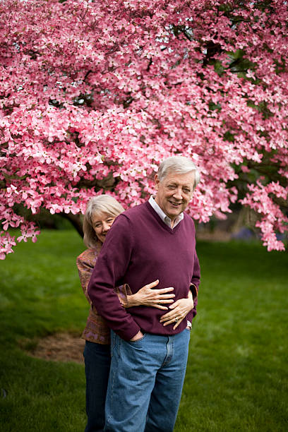 Couple Being Silly in Back Yard stock photo