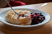A Slovenian dessert: truklji, a traditional Slovene dish, composed of dough and a filling of sweet cottage cheese, served with berries