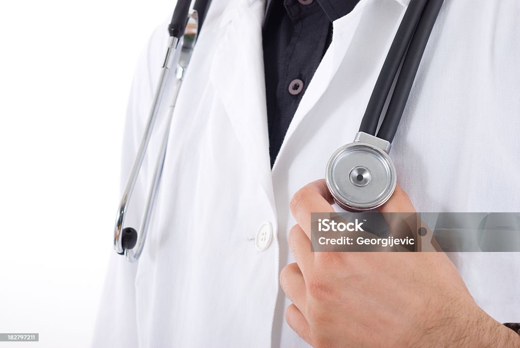 Doctor Close up of a doctors lab white coat with stethoscope.  Adult Stock Photo