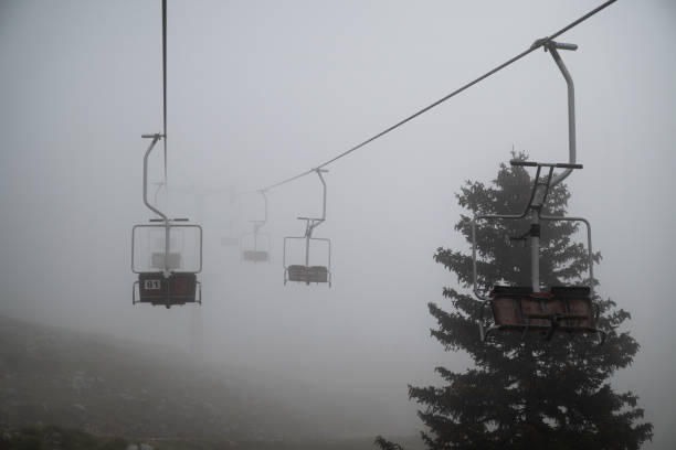 Open Cable car in foggy weather