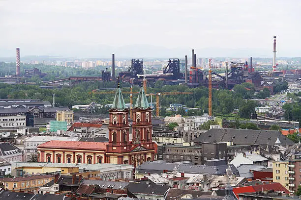 "Horizontal cityscape of the Ostrava city, 3rd largest city in Czech Republic, famous for coal mining history and many other heavy industry in these days."