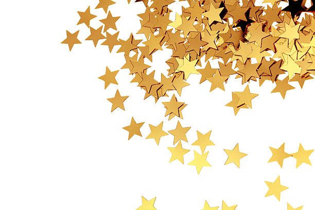 Many golden confetti stars. Isolated on pure white.