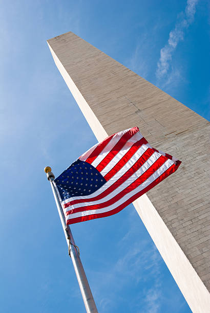 istock Flapping flag in front of Washington Monument 182798495