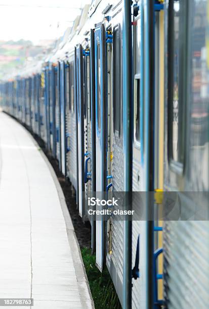 Commuter Train Mid Day Stock Photo - Download Image Now - Activity, Arrival, Blue