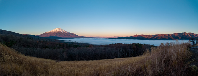 Panorama of sunrise with mountain Fuji view from Panorama Dai view point, Lake Yamanaka, Yamanashi, Japan