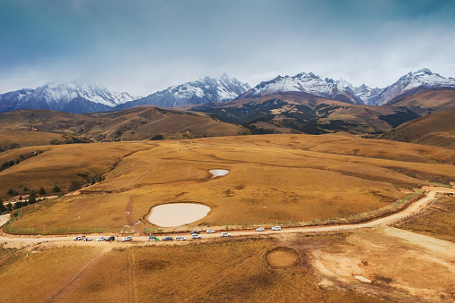 Natural beauty of snow mountains and grassland pastures on the plateau of Xizang Autonomous Region, China On October 13, 2023