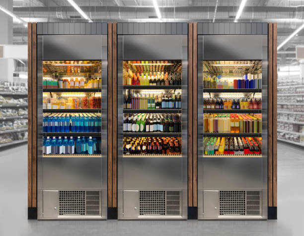 istock Soda pop drinks and soft drinks, beer and wine in vertical elegant refrigerator at airport restaurant 1828017827