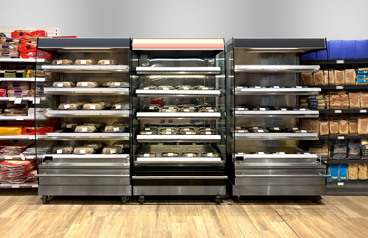 Mobile Warming Carts and Heated Display Cases in supermarket pastry department. Mockup and illustration are great for graphic designers, interior designers and architects.
