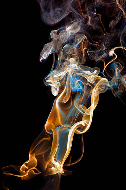 istock Colorful Smoke on Black Background 182801861