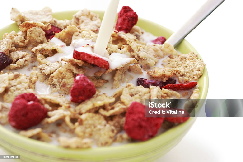 Corn Flakes. Isolated on white.Shallow dof. Berry Fruit Stock Photo