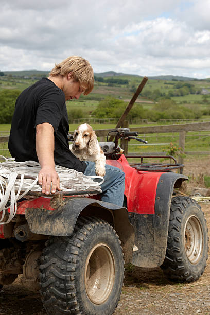 istock Handsome young man on quad bike 182802115