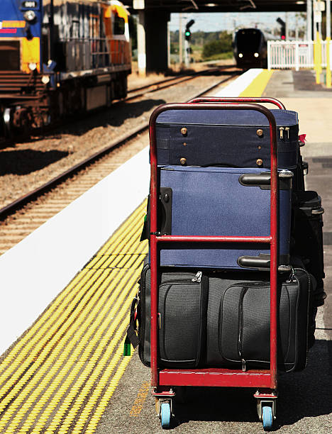 istock Trains and Luggage Trolly at Railway Station 182802220