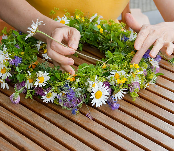 Wreath making on a mid summer day stock photo