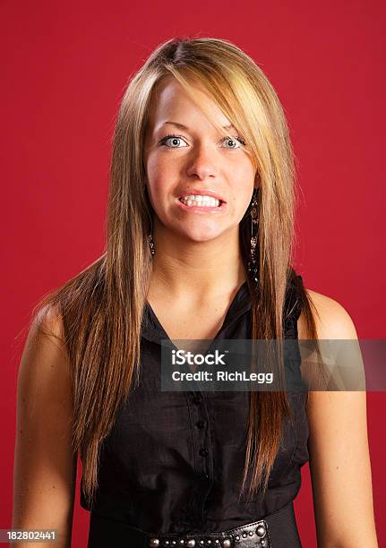 Teenage Girl Clenching Teeth Stock Photo - Download Image Now - Adult, Beautiful People, Beauty