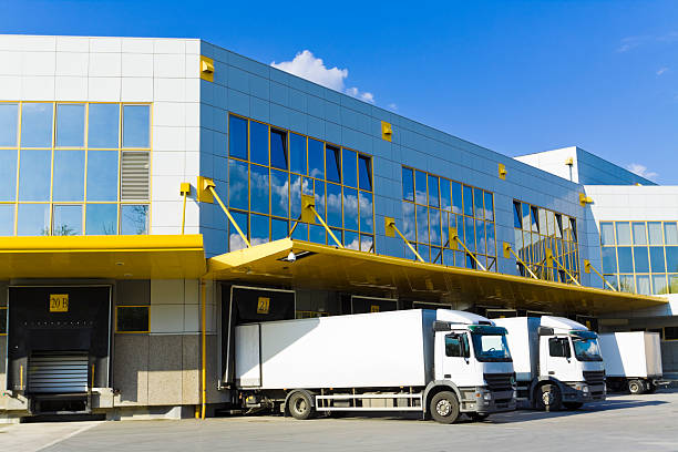 modern loading docks transportation trucks in front of modern loading docksCHECK OTHER SIMILAR IMAGES IN MY PORTFOLIO.... loading bay stock pictures, royalty-free photos & images