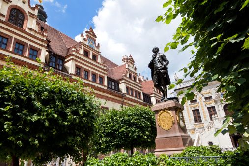 Monument of Johann Wolfgang Goethe in Leipzig (Saxony) in Germany. It's made in 1902 from C. L. Seffner (1861-1932) and stands in front of the old stock exchange. On the left side the old townhall from Leipzig.