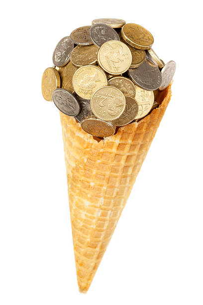 Sweet money ice cream. Australian coins ball ice cream with waffle cone isolated on white. australian 5 cents stock pictures, royalty-free photos & images