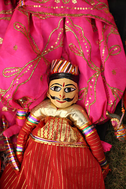 Indian Folk Dolls Indian puppet dolls in the outdoor market in Agra. doll puppet indian culture small stock pictures, royalty-free photos & images