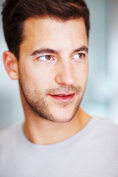 istock Smart Caucasian man looking away in thought 182803289