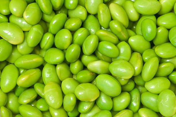 Soy Beans Background Full frame macro of soy beans. boiled photos stock pictures, royalty-free photos & images