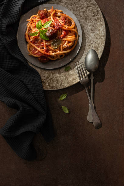 istock Spaghetti with meatballs and tomato sauce 1828041186