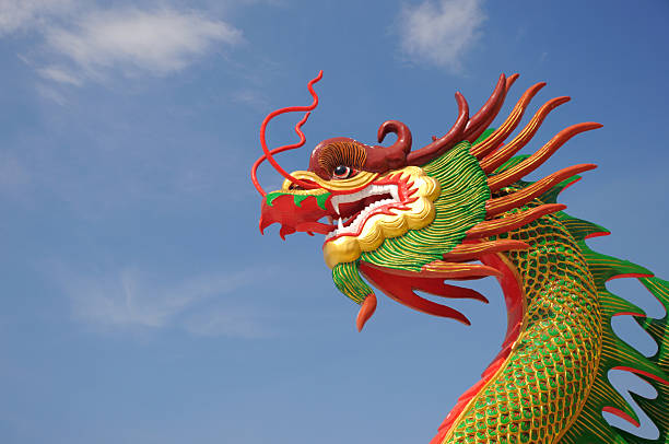 istock Chinese Dragon Head and blue sky 182804815