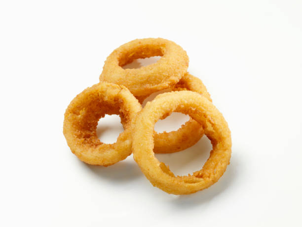 Thick Cut Onion Rings Thick Cut Onion Rings -Photographed on Hasselblad H3D2-39mb Camera fried onion rings stock pictures, royalty-free photos & images